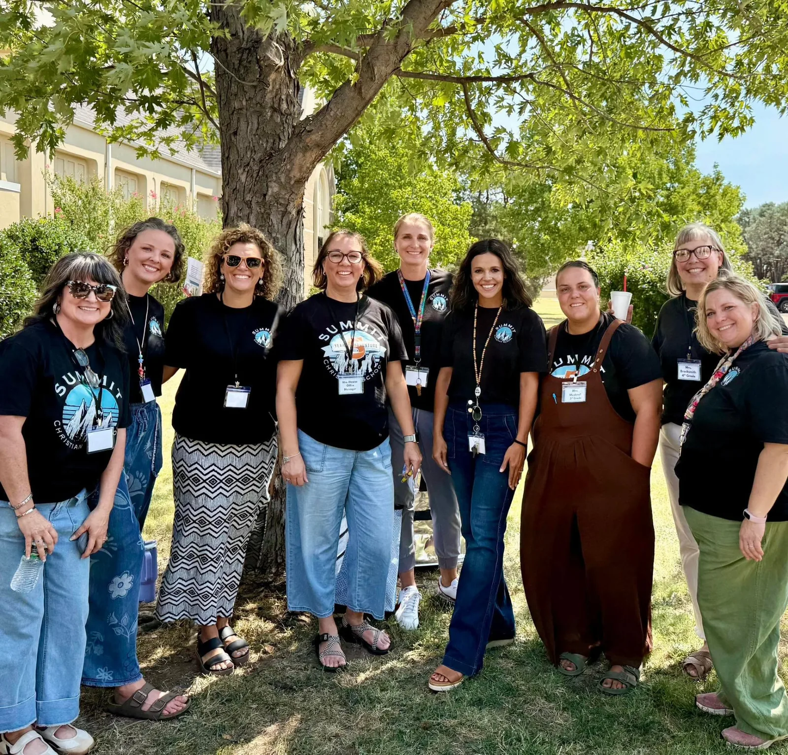 Summit Christian School teachers gathered together outdoors